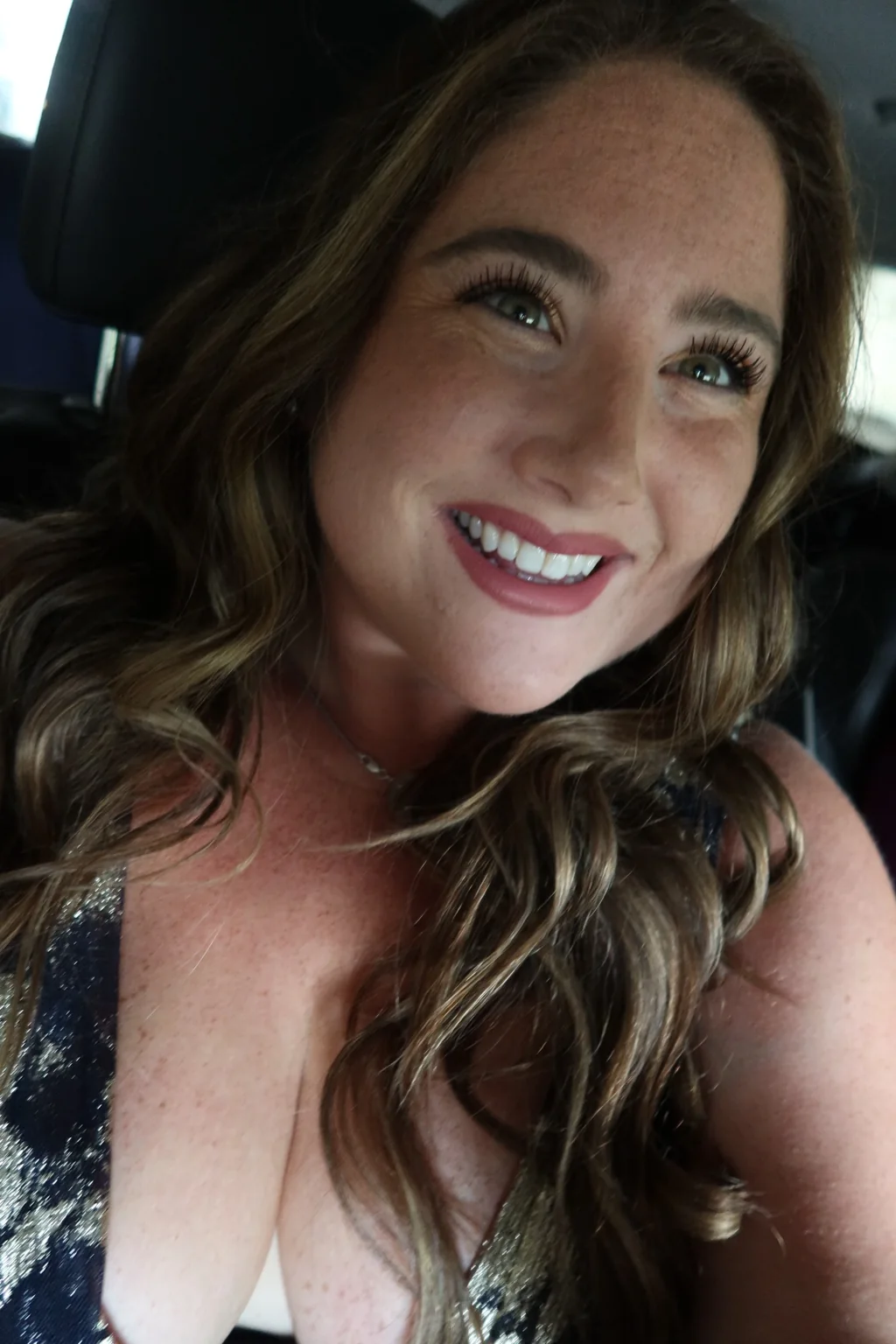 Taylor smiling in a beauty selfie
